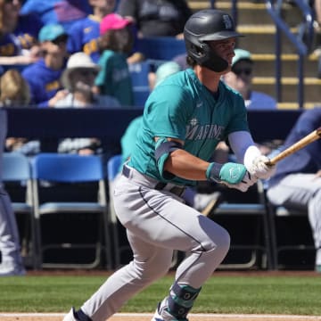 Seattle Mariners second baseman Cole Young hits during a game against the Milwaukee Brewers on March 9 at American Family Fields of Phoenix.