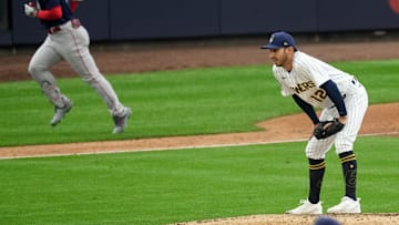 Apr 23, 2023; Milwaukee Brewers relief pitcher Javy Guerra (12) gives up a grand slam home run to