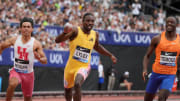 Noah Lyles (USA), center, defeats Louie Hinchliffe (GBR), left, and Letsile Tebogo (BOT) to win the 100m in 9.81 during the London Athletics Meet at London Stadium