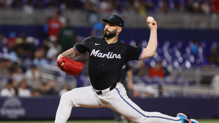 Jul 19, 2024; Miami, Florida, USA; Miami Marlins relief pitcher Tanner Scott (66) delivers a pitch against the New York Mets during the ninth inning at loanDepot Park. Mandatory Credit: Sam Navarro-USA TODAY Sports