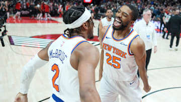 Mar 12, 2025; Portland, Oregon, USA; New York Knicks small forward Mikal Bridges (25) celebrates with point guard Miles McBride (2) after the game against the Portland Trail Blazers at Moda Center. Mandatory Credit: Soobum Im-Imagn Images