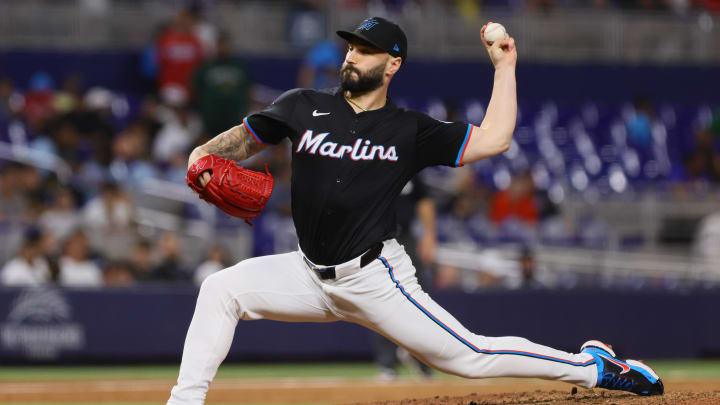 Jul 19, 2024; Miami, Florida, USA; Miami Marlins relief pitcher Tanner Scott (66) delivers a pitch against the New York Mets during the ninth inning at loanDepot Park. Mandatory Credit: Sam Navarro-USA TODAY Sports