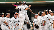 Vanderbilt catcher Colin Barczi (44) celebrates with Vanderbilt utility RJ Austin (42) after Barczi's hits his second home run of the night during a NCAA baseball game between the Tennessee Volunteers and Vanderbilt Commodores at Lindsey Nelson Stadium on May 11, 2025.