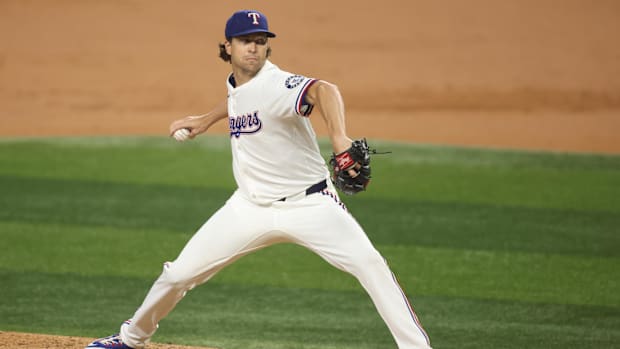 Texas Rangers pitcher Jacob deGrom (48) throws a pitch against the Houston Astros during the third inning at Globe Life Field
