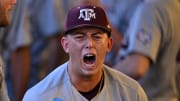 Jun 9, 2024; College Station, TX, USA; Texas A&M pitcher Kaiden Wilson (30) reacts to a double play to close out the fourth inning against Oregon at Olsen Field, Blue Bell Park.