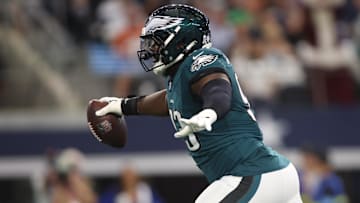 Nov 10, 2024; Arlington, Texas, USA; Philadelphia Eagles defensive tackle Milton Williams (93) celebrates recovering a fumble against the Dallas Cowboys in the first quarter at AT&T Stadium. Mandatory Credit: Tim Heitman-Imagn Images