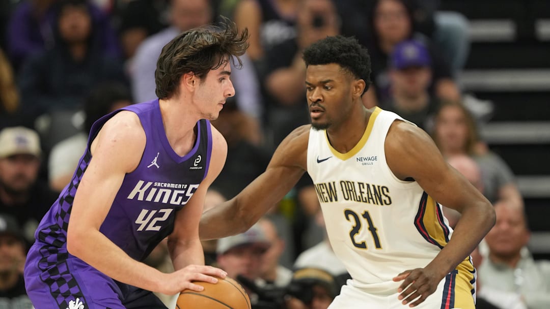 Apr 3, 2026; Sacramento, California, USA; Sacramento Kings center Maxime Raynaud (42) dribbles against New Orleans Pelicans center Yves Missi (21) during the second quarter at Golden 1 Center. Mandatory Credit: Darren Yamashita-Imagn Images