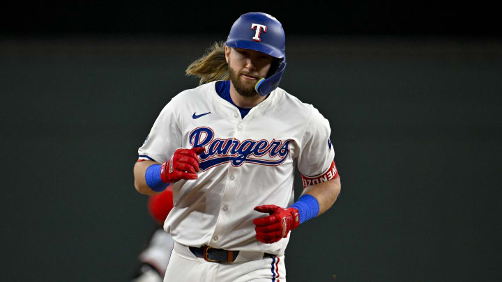 Apr 27, 2024; Arlington, Texas, USA; Texas Rangers second baseman Davis Wendzel (38) rounds the bases after he hits his first career major league home run during the ninth inning against the Cincinnati Reds at Globe Life Field. Mandatory Credit: Jerome Miron-USA TODAY Sports