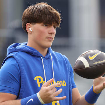 Oct 25, 2025; Pittsburgh, Pennsylvania, USA; Pittsburgh Panthers quarterback Mason Heintschel (6) warms up before the game against the North Carolina State Wolfpack at Acrisure Stadium. Mandatory Credit: Charles LeClaire-Imagn Images