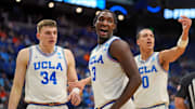 Mar 20, 2025; Lexington, KY, USA;  UCLA Bruins guard Eric Dailey Jr. (3) reacts during the second half against the Utah State Aggies in the first round of the NCAA Tournament at Rupp Arena. Mandatory Credit: Aaron Doster-Imagn Images
