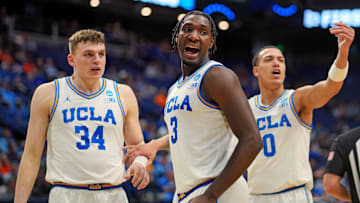 Mar 20, 2025; Lexington, KY, USA;  UCLA Bruins guard Eric Dailey Jr. (3) reacts during the second half against the Utah State Aggies in the first round of the NCAA Tournament at Rupp Arena. Mandatory Credit: Aaron Doster-Imagn Images