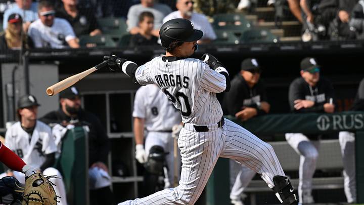 Jun 24, 2026; Chicago, Illinois, USA; Chicago White Sox third baseman Miguel Vargas (20) hits a single against the Cleveland Guardians during the third inning at Rate Field. Mandatory Credit: Patrick Gorski-Imagn Images