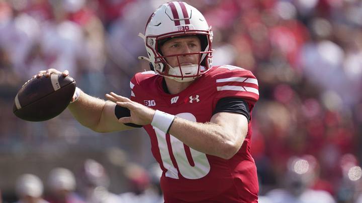Sep 14, 2024; Madison, Wisconsin, USA;  Wisconsin Badgers quarterback Tyler Van Dyke (10) throws a pass during the first quarter against the Alabama Crimson Tide at Camp Randall Stadium. Mandatory Credit: Jeff Hanisch-Imagn Images
