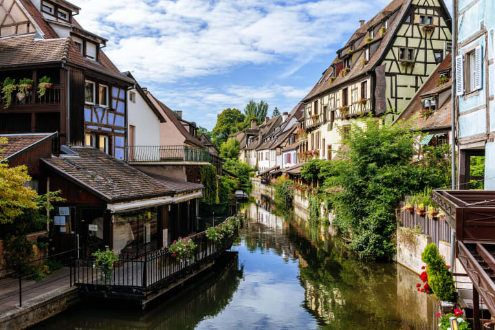  half-timbered houses along the water in Colmar, France