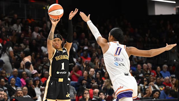 A photo of Satou Sabally contesting a sho