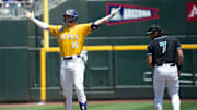 Jun 22, 2025; Omaha, Neb, USA;  LSU Tigers designated hitter Ethan Frey (16) gestures toward the bench after driving in a run with a double against the Coastal Carolina Chanticleers during the third inning at Charles Schwab Field.