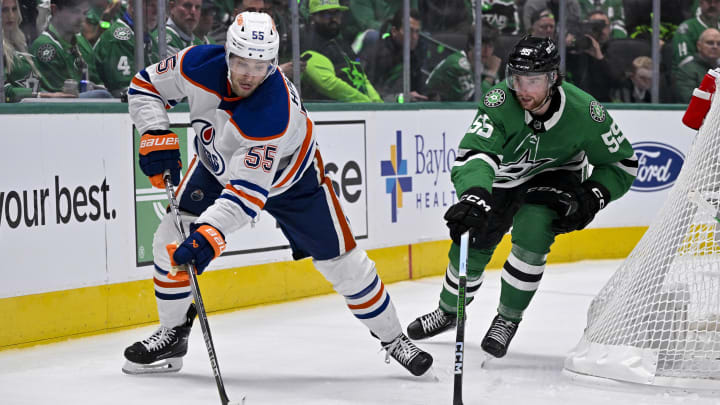 May 25, 2024; Dallas, Texas, USA; Edmonton Oilers left wing Dylan Holloway (55) and Dallas Stars defenseman Thomas Harley (55) in action during the game between the Dallas Stars and the Edmonton Oilers in game two of the Western Conference Final of the 2024 Stanley Cup Playoffs at American Airlines Center. Mandatory Credit: Jerome Miron-USA TODAY Sports