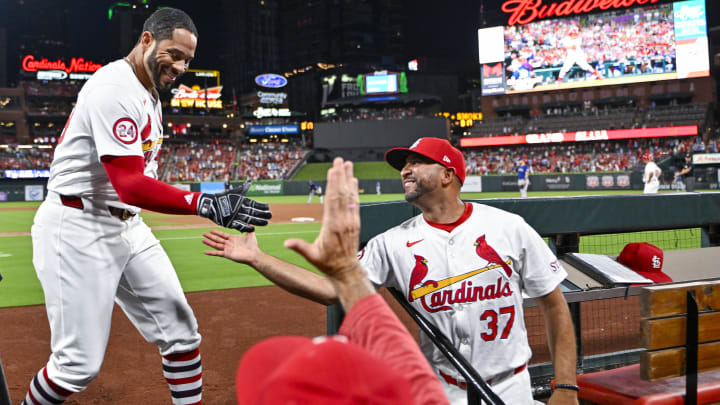 Jul 30, 2024; St. Louis, Missouri, USA;  St. Louis Cardinals pinch hitter Tommy Pham (29) celebrates with manager Oliver Marmol (37) after hitting a grand slam home run against the Texas Rangers during the fifth inning at Busch Stadium. Mandatory Credit: Jeff Curry-USA TODAY Sports