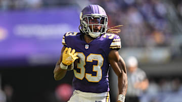 Sep 22, 2024; Minneapolis, Minnesota, USA; Minnesota Vikings running back Aaron Jones (33) in action during the game against the Houston Texans at U.S. Bank Stadium. Mandatory Credit: Jeffrey Becker-Imagn Images