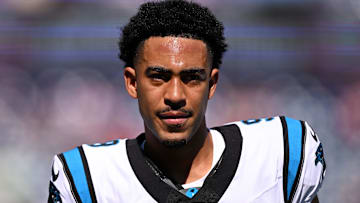 Sep 28, 2025; Foxborough, Massachusetts, USA; Carolina Panthers quarterback Bryce Young (9) runs off of the field during warmups before a game against the New England Patriots at Gillette Stadium. 