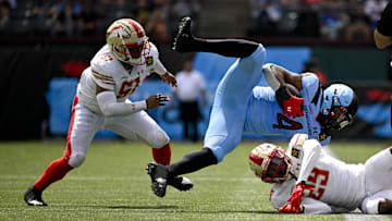 Mar 30, 2024; Arlington, TX, USA; Arlington Renegades running back Leddie Brown (4) is tackled by Birmingham Stallions Damon Lloyd (51) and defensive back Ike Brown (29) during the first half at Choctaw Stadium. Mandatory Credit: Jerome Miron-Imagn Images