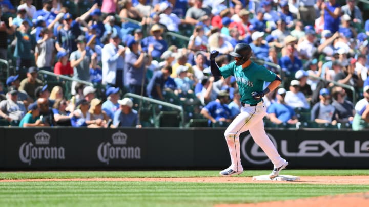 Seattle Mariners right fielder Mitch Haniger (17) runs the bases after hitting a home run against the Toronto Blue Jays during the ninth inning at T-Mobile Park on July 6.