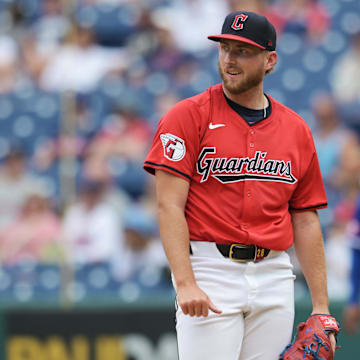 Aug 28, 2024; Cleveland, Ohio, USA; Cleveland Guardians starting pitcher Tanner Bibee (28) reacts after Kansas City Royals shortstop Bobby Witt Jr. (not pictured) hit a home run during the third inning at Progressive Field. Mandatory Credit: Ken Blaze-Imagn Images