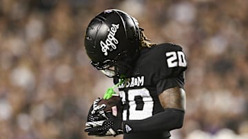 Oct 26, 2024; College Station, Texas, USA; Texas A&M Aggies defensive back BJ Mayes (20) reacts after intercepting a pass against the LSU Tigers during the fourth quarter. The Aggies defeated the Tigers 38-23; at Kyle Field. Mandatory Credit: Maria Lysaker-Imagn Images.  