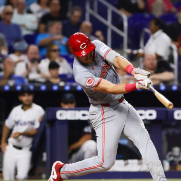 Aug 5, 2024; Miami, Florida, USA; Cincinnati Reds catcher Tyler Stephenson (37) hits a single Miami Marlins during the third inning at loanDepot Park. Mandatory Credit: Sam Navarro-USA TODAY Sports