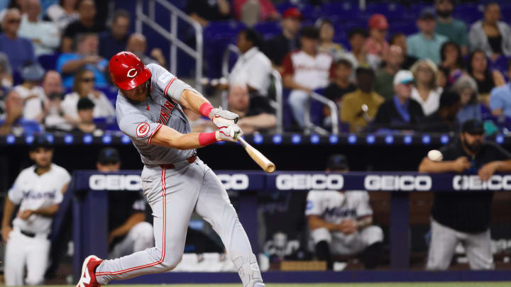 Aug 5, 2024; Miami, Florida, USA; Cincinnati Reds catcher Tyler Stephenson (37) hits a single Miami Marlins during the third inning at loanDepot Park. Mandatory Credit: Sam Navarro-USA TODAY Sports