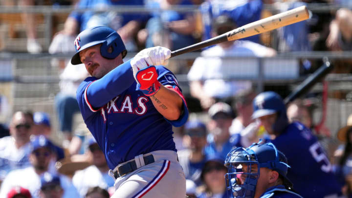 Mar 9, 2024; Phoenix, Arizona, USA; Texas Rangers first baseman Blaine Crim (74) bats against the Los Angeles Dodgers during the second inning at Camelback Ranch-Glendale. Mandatory Credit: Joe Camporeale-USA TODAY Sports