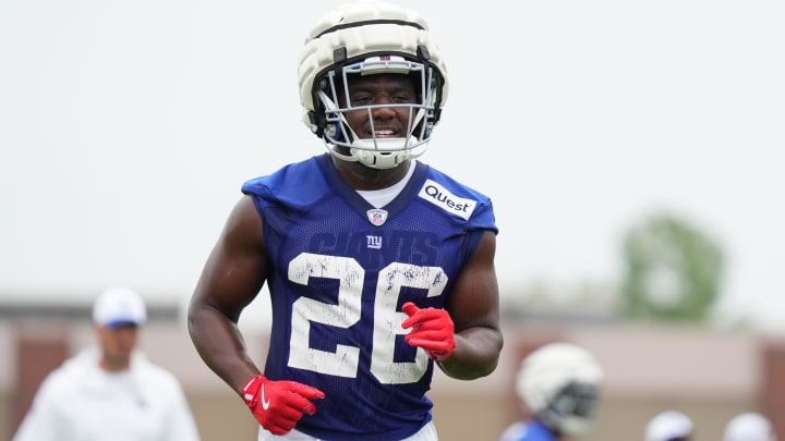 Jul 25, 2024; East Rutherford, NY, USA; New York Giants running back Devin Singletary (26) participates in a drill during training camp at Quest Diagnostics Training Center.  