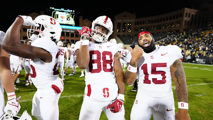 Oct 13, 2023; Boulder, Colorado, USA; Stanford Cardinal tight end C.J. Hawkins (88) and running back Ryan Butler (15) and wide receiver Ismael Cisse (25) celebrate defeating the Colorado Buffaloes in double overtime at Folsom Field. Mandatory Credit: Ron Chenoy-Imagn Images