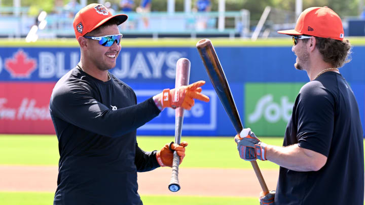 Mar 15, 2024; Dunedin, Florida, USA; Detroit Tigers outfielder Bligh Madris (67) and outfielder Zach McKinstry (39) talk before the start of a spring training game against the Toronto Blue Jays at TD Ballpark. 