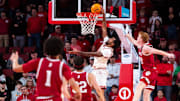 Dec 13, 2024; Lincoln, Nebraska, USA; Nebraska Cornhuskers guard Brice Williams (3) shoots the ball against Indiana Hoosiers forward Luke Goode (10) during the second half at Pinnacle Bank Arena.