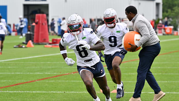 Jun 9, 2025; Foxborough, MA, USA; New England Patriots wide receiver Stefon Diggs (8) and wide receiver Kayshon Boutte (9) ru Jun 9, 2025; Foxborough, MA, USA; New England Patriots wide receiver Stefon Diggs (8) and wide receiver Kayshon Boutte (9) ru
