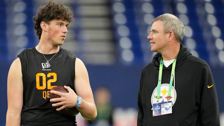Penn State quarterback Drew Allar (QB02) speaks with Pittsburgh Steelers quarterbacks coach Tim Berbenich