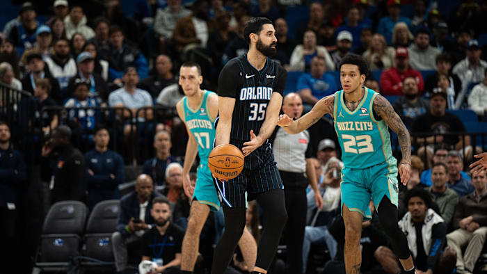 Mar 19, 2024; Orlando, Florida, USA;  Orlando Magic center Goga Bitadze (35) passes the ball against