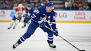 Apr 12, 2025; Toronto, Ontario, CAN;  Toronto Maple Leafs forward John Tavares (91) skates with the puck against the Montreal Canadiens in the third period at Scotiabank Arena. Mandatory Credit: Dan Hamilton-Imagn Images