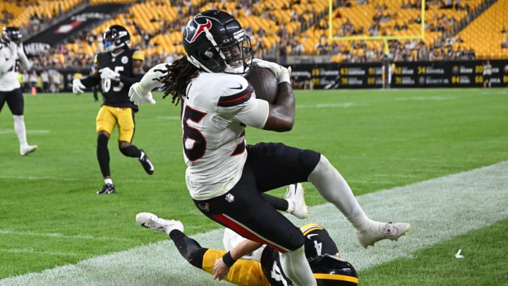 Aug 9, 2024; Pittsburgh, Pennsylvania, USA;  Houston Texans safety Brandon Hill (36) is knocked out of bounds on a return by Pittsburgh Steelers quarterback Kyle Allen during the fourth quarter at Acrisure Stadium. Mandatory Credit: Barry Reeger-USA TODAY Sports