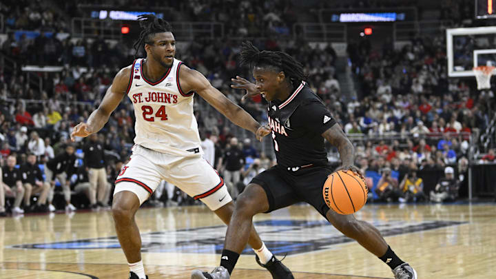 St. John’s center Zuby Ejiofor (left) is a one-man wrecking crew.