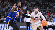 Purdue guard Braden Smith (3) drives against McNeese's Bryant Selebangue during the second round of the NCAA Tournament.
