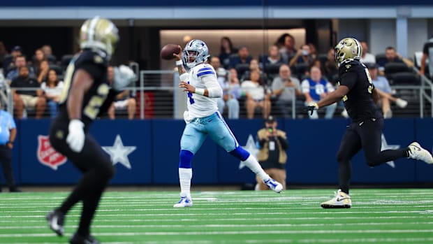 Dallas Cowboys quarterback Dak Prescott (4) throws during the first half against the New Orleans Saints at AT&T Stadium.