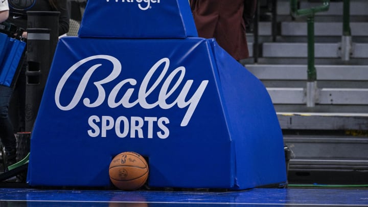 Oct 7, 2022; A view of a game ball and the Bally Sports logo on the stanchion post before the game between the Dallas Mavericks and the Orlando Magic at the American Airlines Center. 