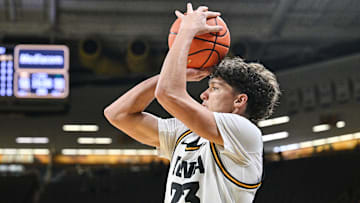 Nov 20, 2025; Iowa City, Iowa, USA; Iowa Hawkeyes guard Isaia Howard (23) shoots the ball against the Chicago State Cougars during the second half at Carver-Hawkeye Arena. Mandatory Credit: Jeffrey Becker-Imagn Images