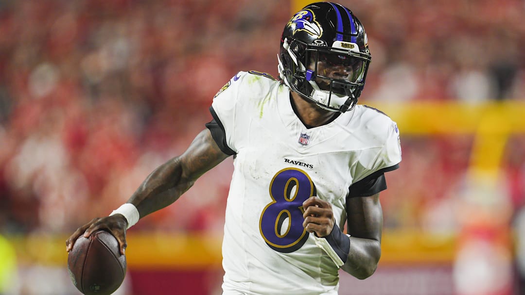 Sep 5, 2024; Kansas City, Missouri, USA; Baltimore Ravens quarterback Lamar Jackson (8) runs the ball during the second half against the Kansas City Chiefs at GEHA Field at Arrowhead Stadium.