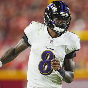 Sep 5, 2024; Kansas City, Missouri, USA; Baltimore Ravens quarterback Lamar Jackson (8) runs the ball during the second half against the Kansas City Chiefs at GEHA Field at Arrowhead Stadium.