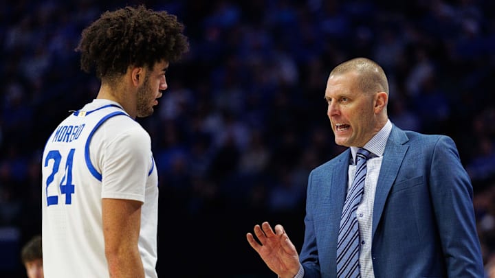Dec 23, 2025; Lexington, Kentucky, USA; Kentucky Wildcats head coach Mark Pope talks with center Malachi Moreno (24) during the second half against the Bellarmine Knights at Rupp Arena at Central Bank Center. Mandatory Credit: Jordan Prather-Imagn Images