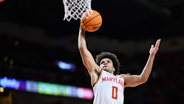 Feb 16, 2025; College Park, Maryland, USA; Maryland Terrapins guard Ja'Kobi Gillespie (0) dunks the ball during the second half against the Iowa Hawkeyes at Xfinity Center. Mandatory Credit: Reggie Hildred-Imagn Images