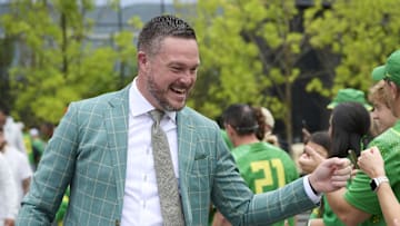 Sep 6, 2025; Eugene, Oregon, USA; Oregon Ducks head coach Dan Lanning greets fans before a game against the Oklahoma State Cowboys at Autzen Stadium. 